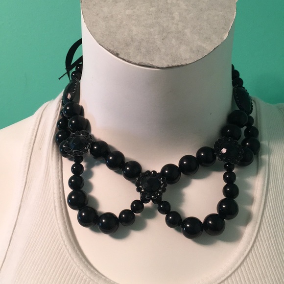 Jewelry - Black beaded necklace with ribbon closure.